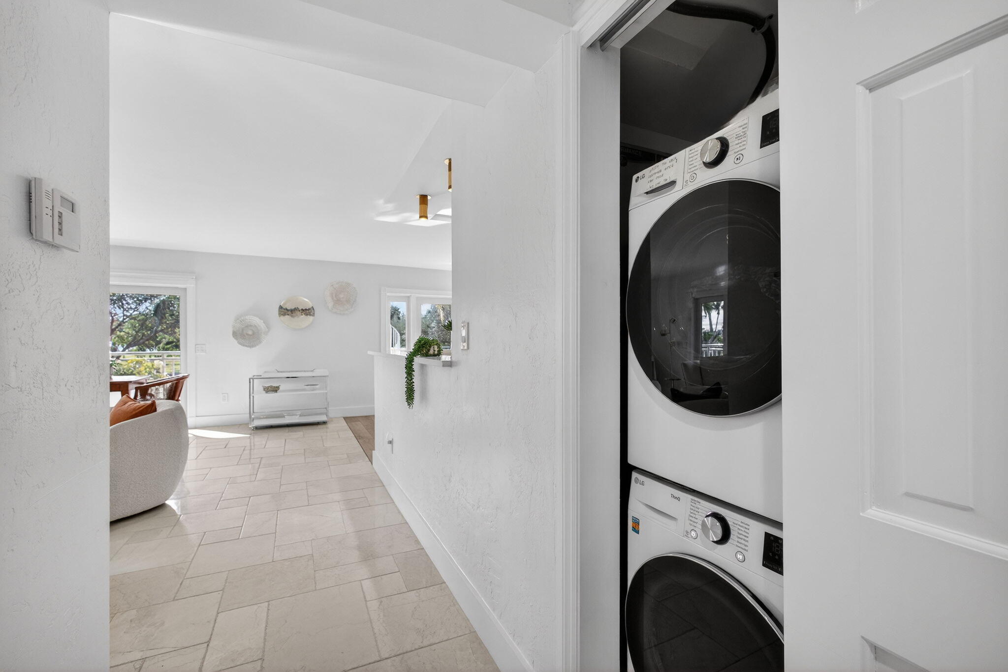 129 South Golfview Road, Unit 6 Lake Worth Beach, FL 33460 - Photo 23 of 51 a view of a kitchen with washer and dryer