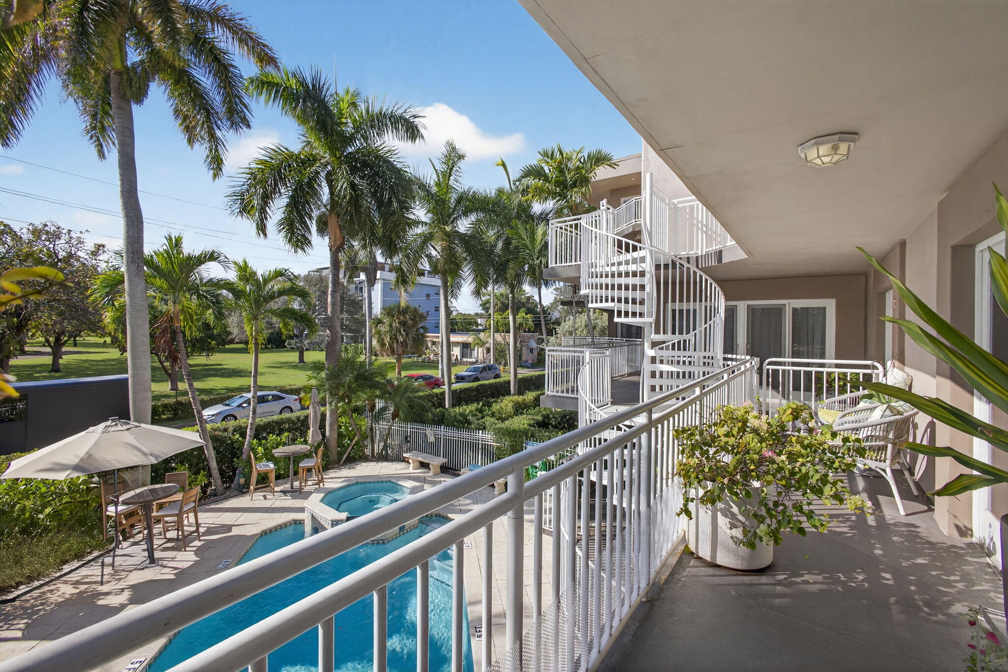 129 South Golfview Road, Unit 6 Lake Worth Beach, FL 33460 - Photo 25 of 51 a view of a chairs and table in the balcony