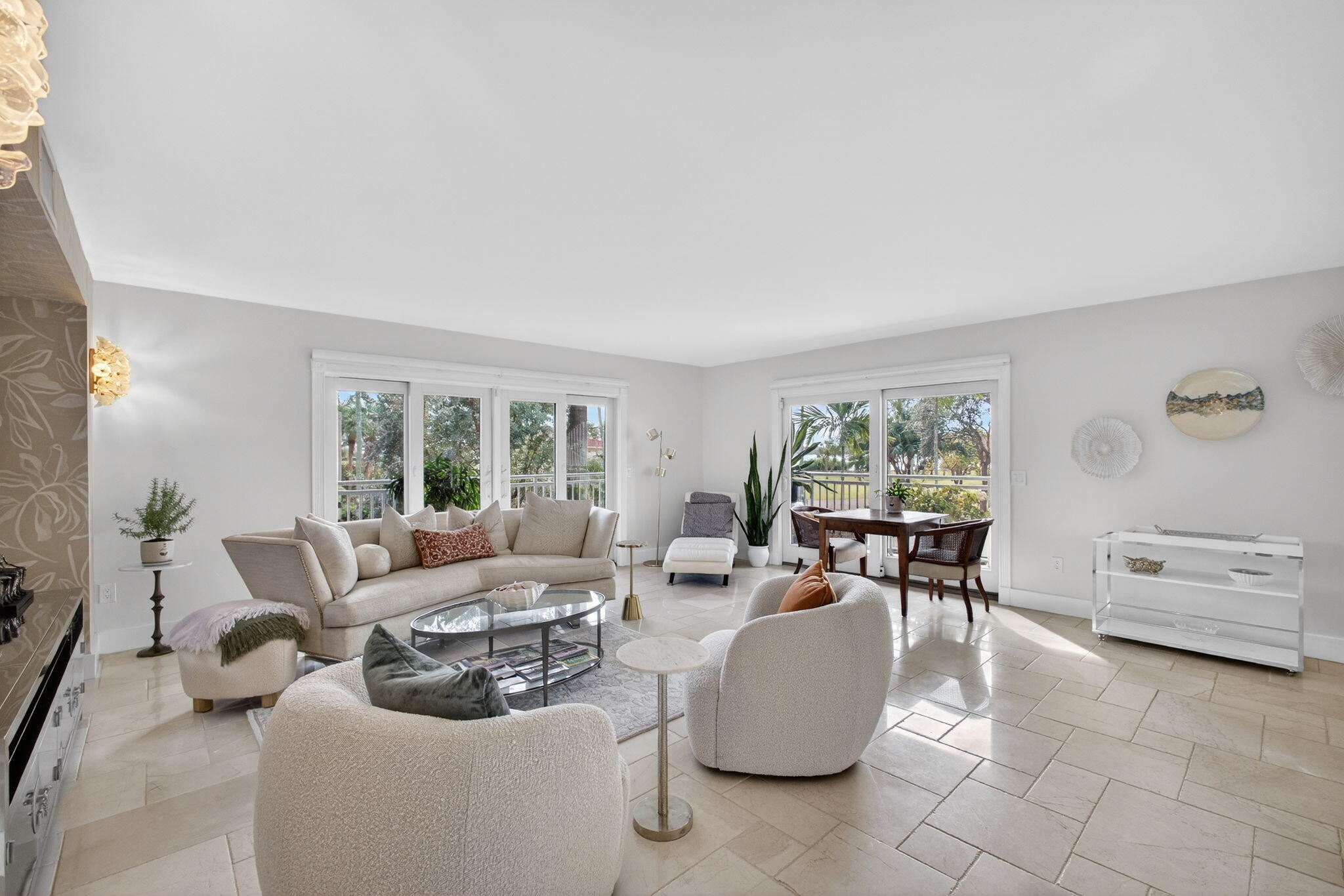 129 South Golfview Road, Unit 6 Lake Worth Beach, FL 33460 - Photo 10 of 51 a living room with furniture and a large window