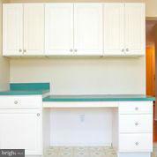 8486 Snowden Oaks Place Laurel, MD 20708 - Photo 4 of 13 Built in cabinet and desk