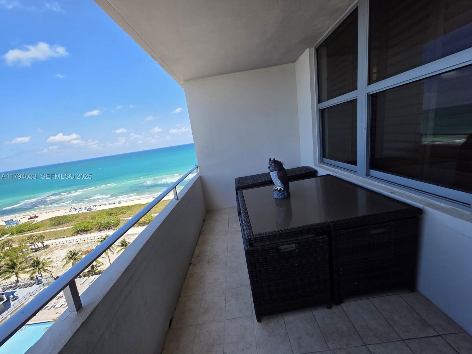 9225 Collins Avenue, Unit 1409 Surfside, FL 33154 - Photo 11 of 41 a view of balcony with furniture