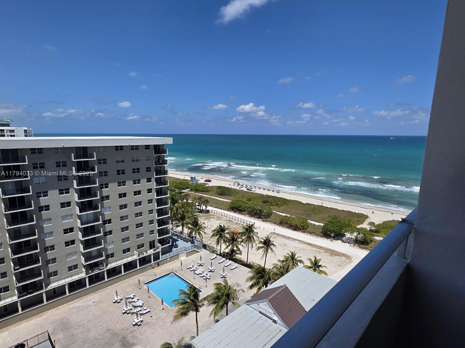 9225 Collins Avenue, Unit 1409 Surfside, FL 33154 - Photo 32 of 41 a view of a balcony with an outdoor space and seating area
