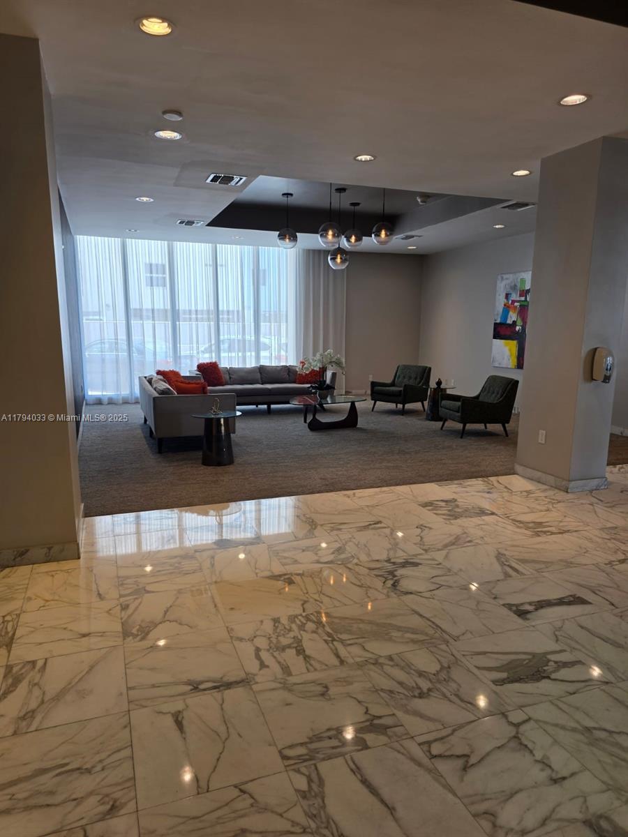 9225 Collins Avenue, Unit 1409 Surfside, FL 33154 - Photo 34 of 41 a view of a room with gym equipment