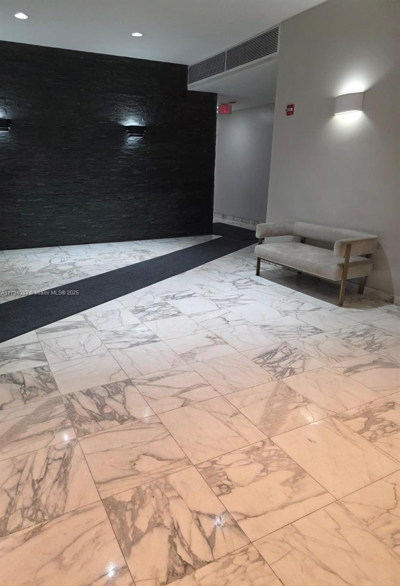 9225 Collins Avenue, Unit 1409 Surfside, FL 33154 - Photo 35 of 41 a view of a garage