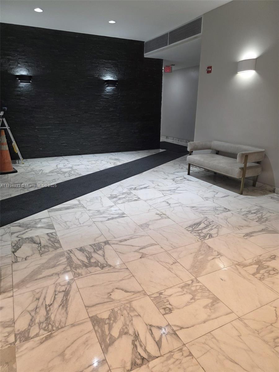 9225 Collins Avenue, Unit 1409 Surfside, FL 33154 - Photo 39 of 41 a view of a projector room