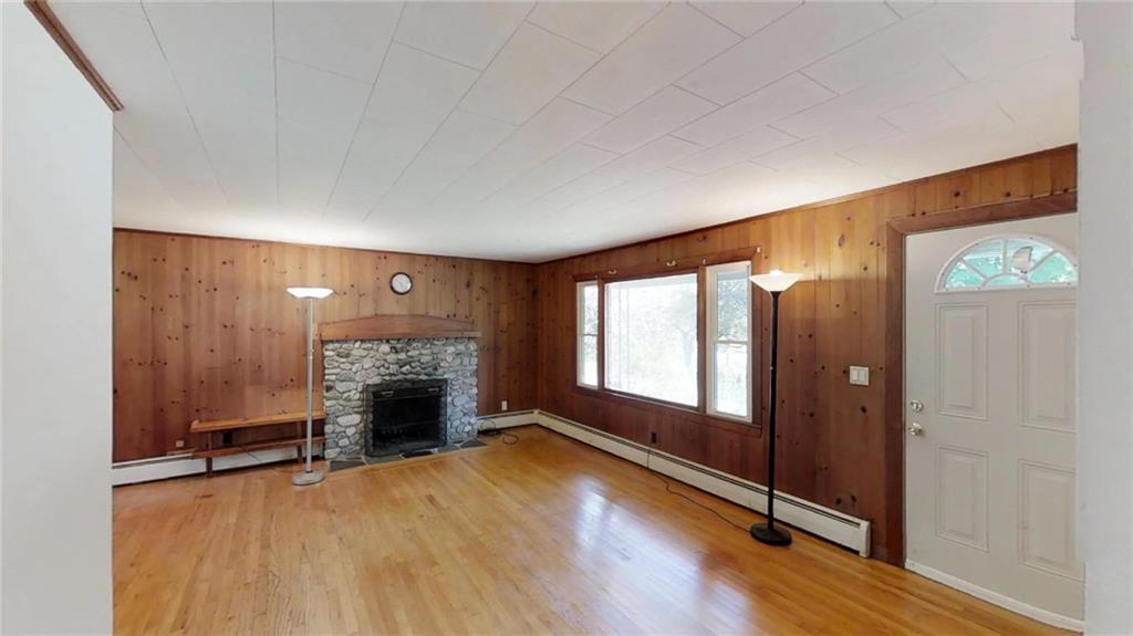 127 Waldoboro Road Washington, ME 04574 - Photo 2 of 17 Livingroom has a lovely stone...