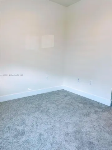 a bathroom with a toilet a sink and bathtub