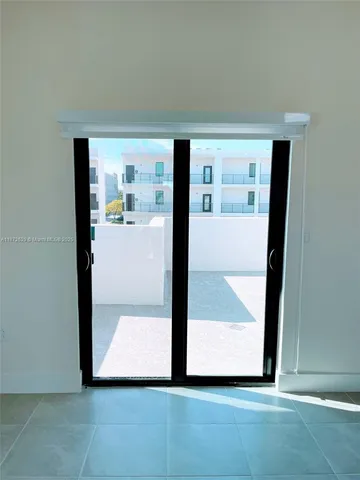 a view of swimming pool with an outdoor seating