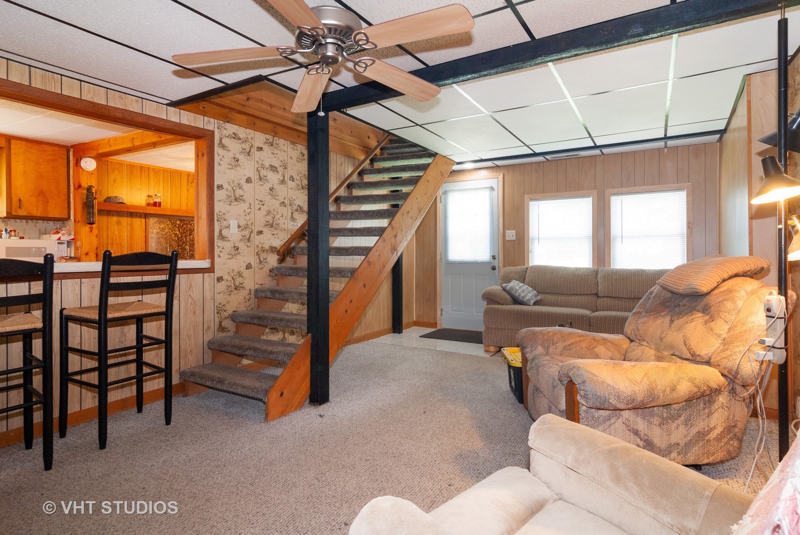 4740 Mill Road Oswego, IL 60543 - Photo 2 of 13 a living room with furniture a ceiling fan and a window