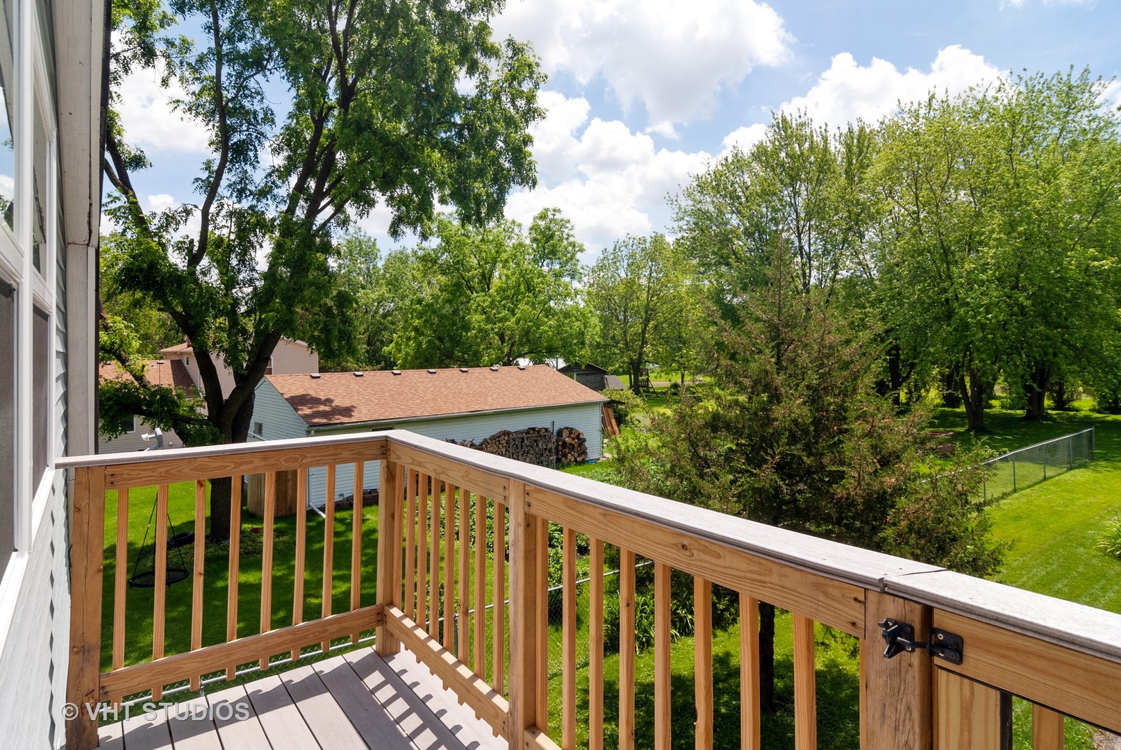 4740 Mill Road Oswego, IL 60543 - Photo 9 of 13 a view of a wooden deck and yard