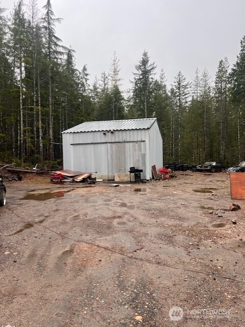15 Dewatto Hills Road Tahuya, WA 98588 - Photo 7 of 17 a view of pool with a yard