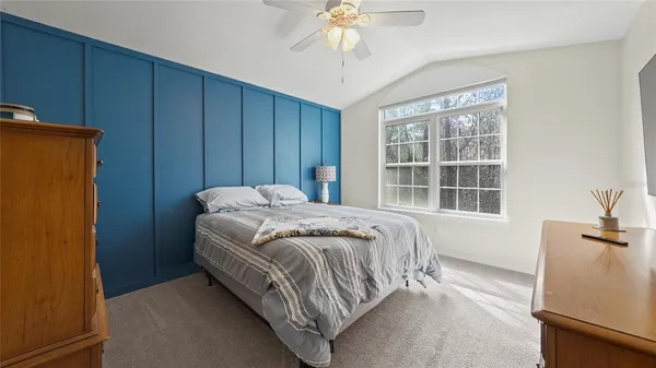 a spacious bathroom with a double vanity sink mirror and double
