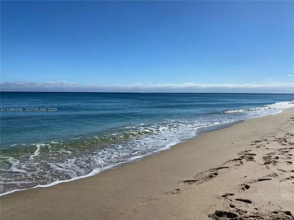 a view of a terrace with a lake view