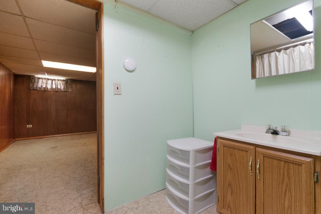 260 Carroll Road Pasadena, MD 21122 - Photo 28 of 29 LOVER LEVEL 1/2 BATH