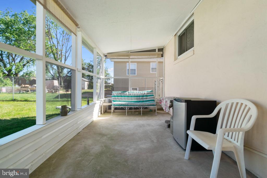 260 Carroll Road Pasadena, MD 21122 - Photo 7 of 29 SCREENED IN PORCH