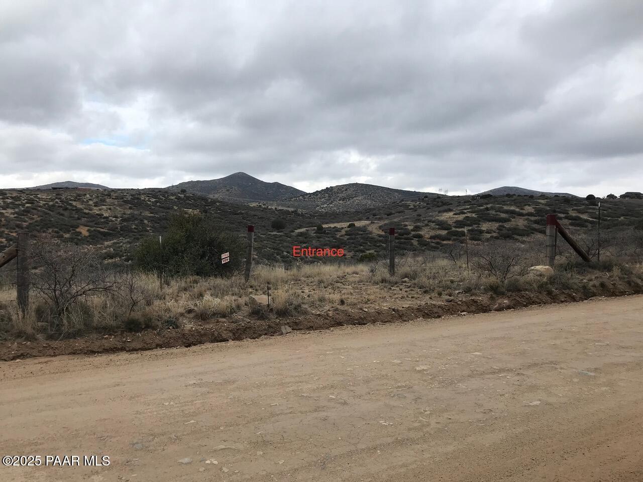1960 South Orme Road Dewey, AZ 86327 - Photo 2 of 13 a view of mountain with wooden fence