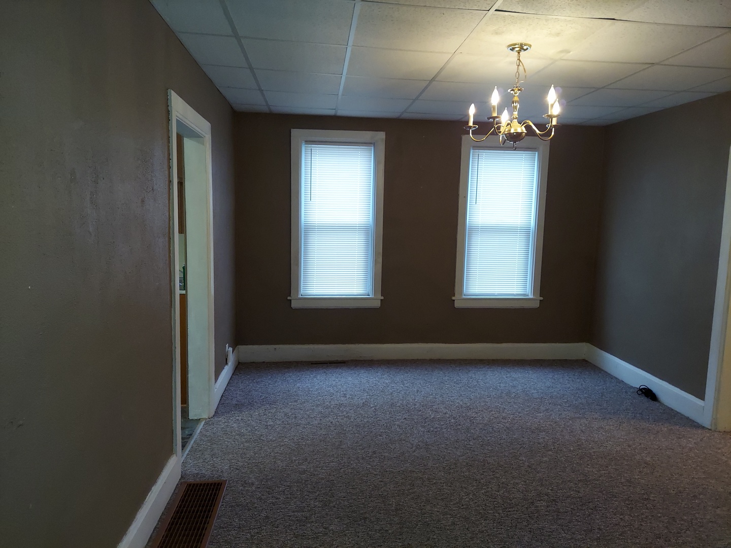718 West Jackson Street Ottawa, IL 61350 - Photo 10 of 25 wooden floor and windows in an empty room