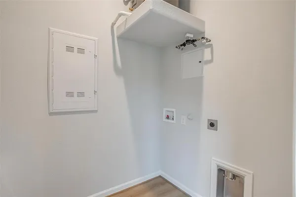 a view of a room that has a window in it