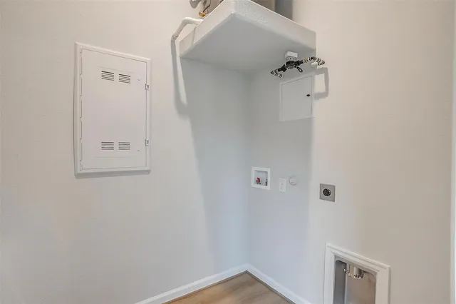 a view of a room that has a window in it