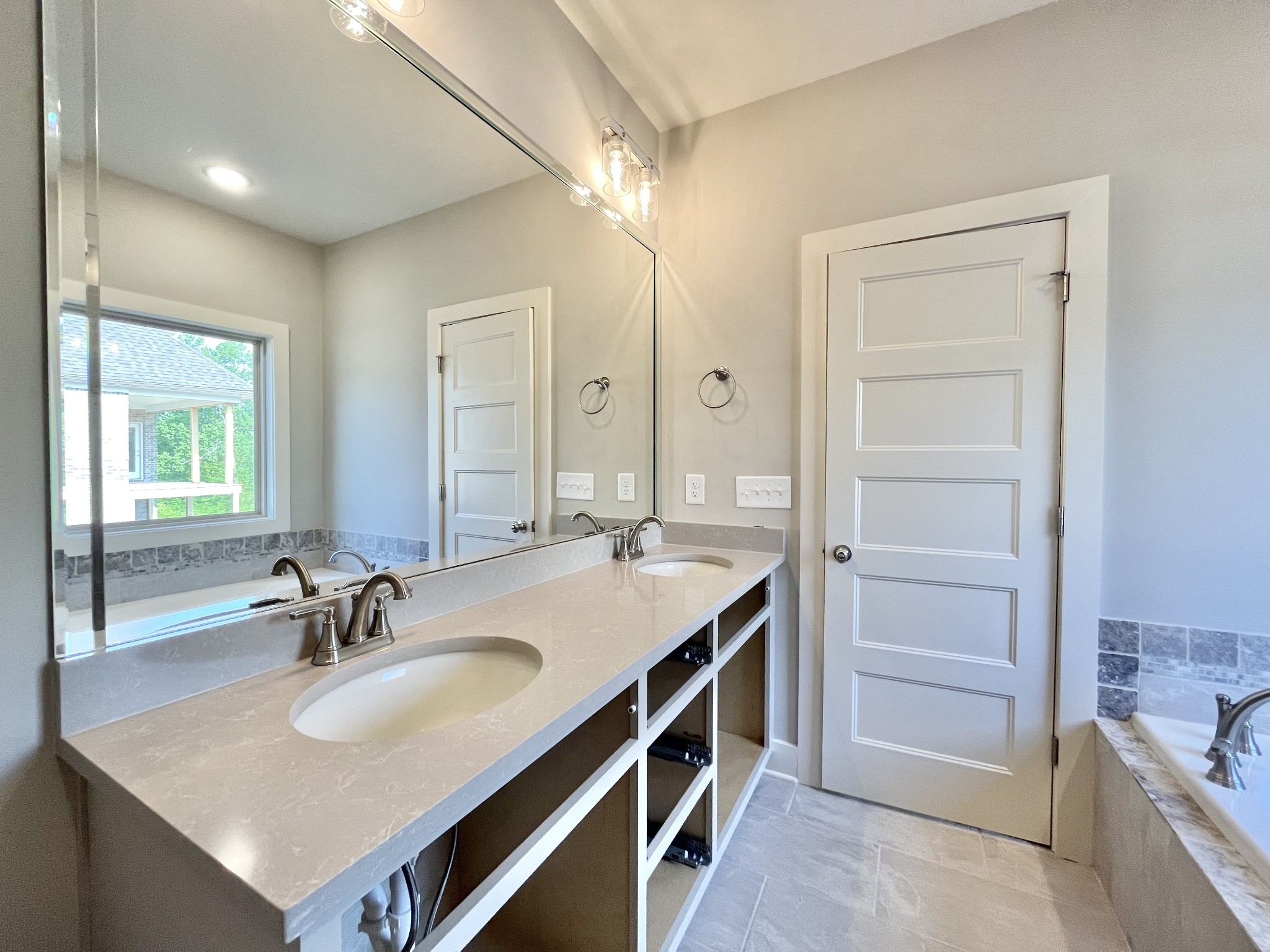 811 Ridgestone Place, Unit 98 Lebanon, TN 37087 - Photo 15 of 21 a bathroom with a sink double vanity and a mirror