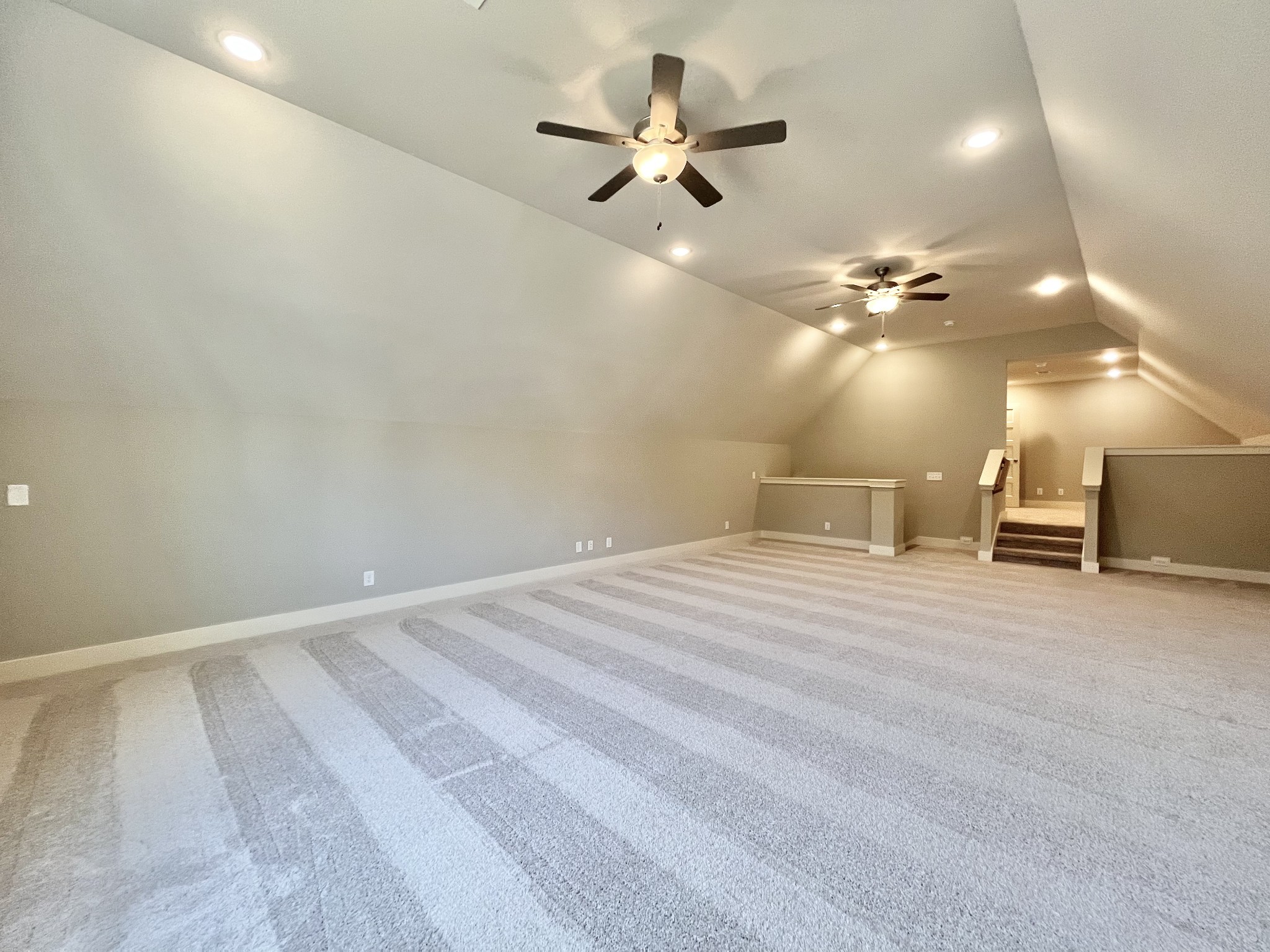 811 Ridgestone Place, Unit 98 Lebanon, TN 37087 - Photo 20 of 21 a view of a room with a ceiling fan and wooden floor