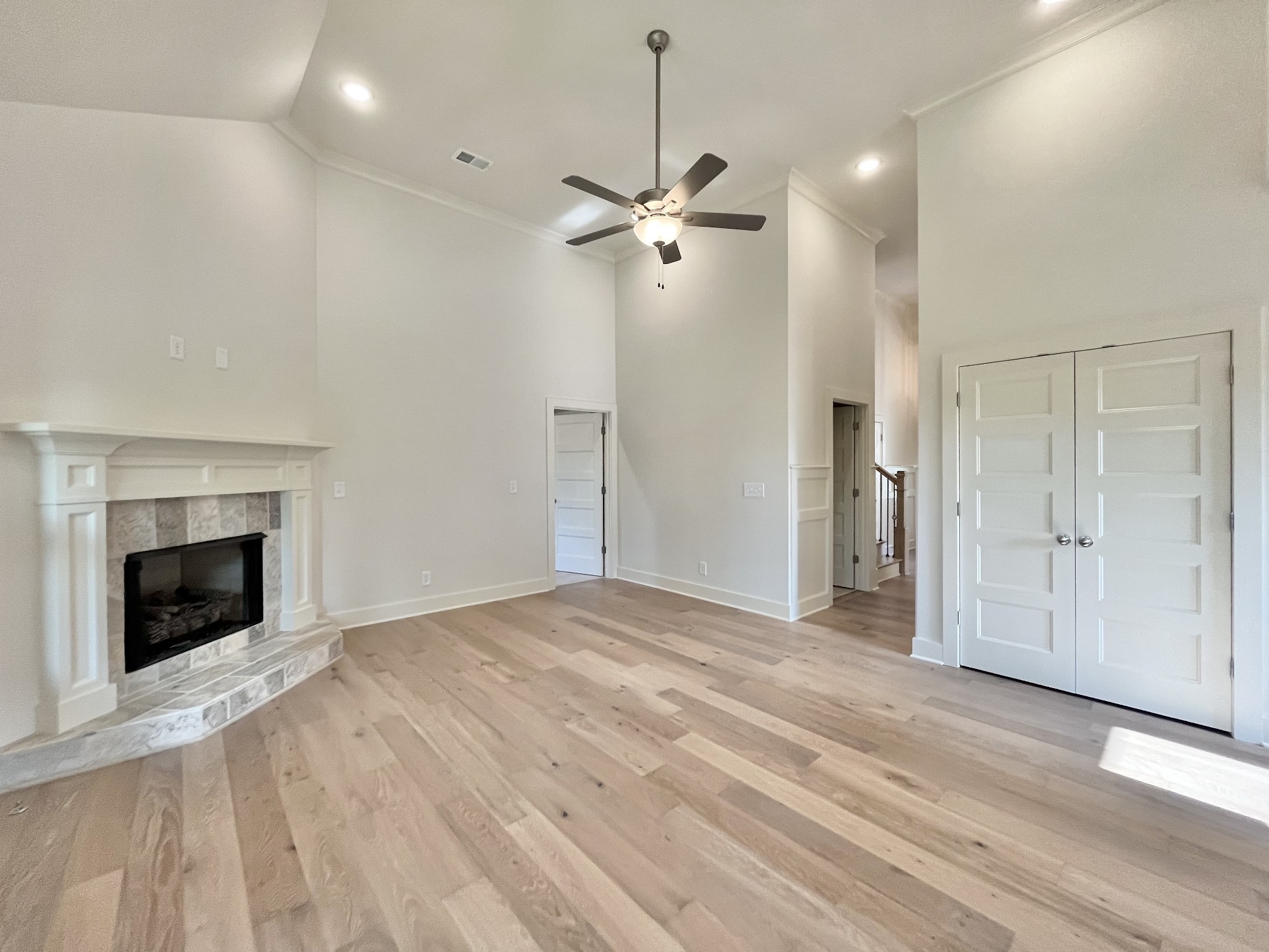 811 Ridgestone Place, Unit 98 Lebanon, TN 37087 - Photo 2 of 21 a view of empty room with a fireplace and wooden floor