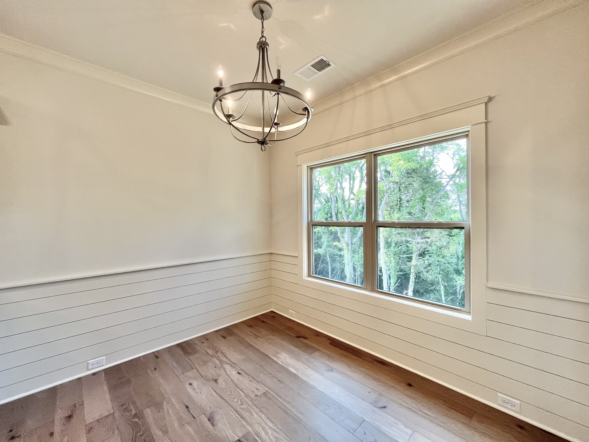 811 Ridgestone Place, Unit 98 Lebanon, TN 37087 - Photo 10 of 21 a view of empty room with wooden floor and window