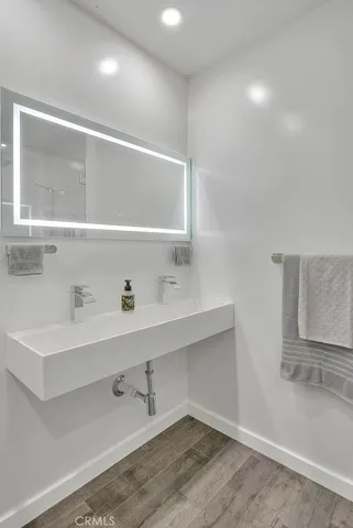 a view of an empty room with a sink