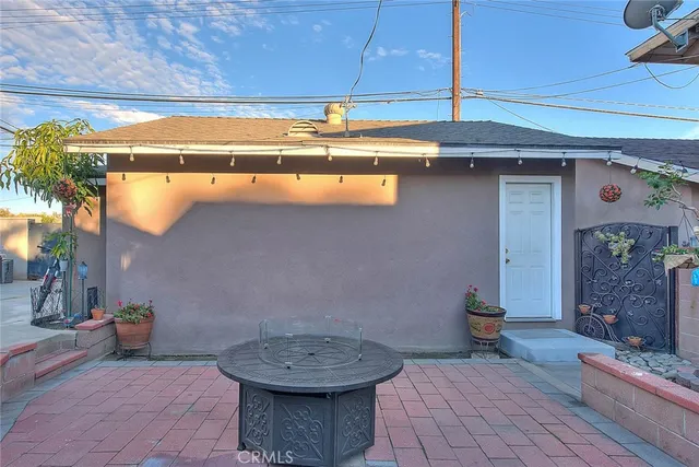a view of a storage room with a table and chairs