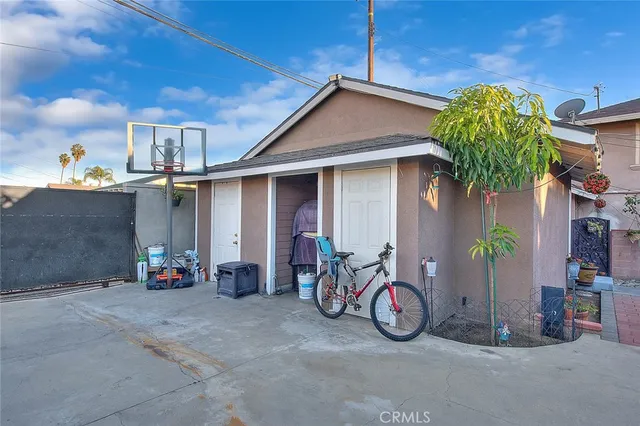a view of car parked in front of house