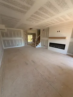 a view of empty room with windows