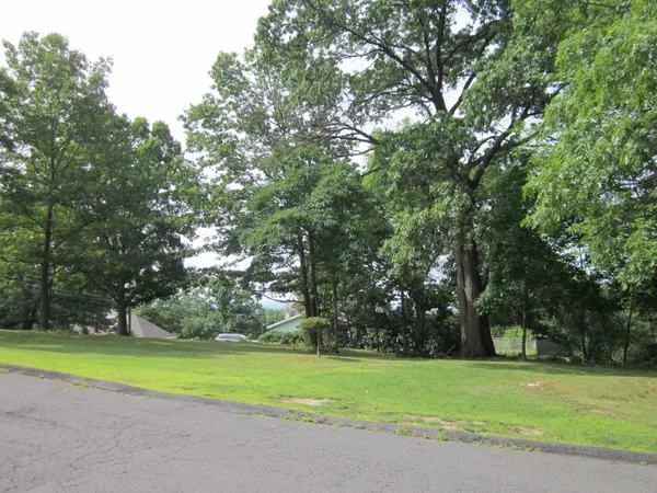 a view of a golf course with a trees