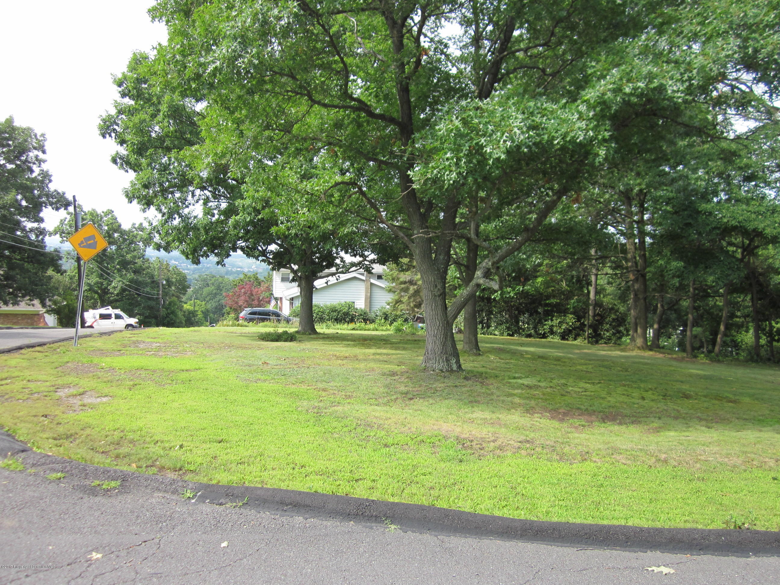 38 Carol Road Peckville, PA 18452 - Photo 6 of 11 a view of a trees in a yard with trees