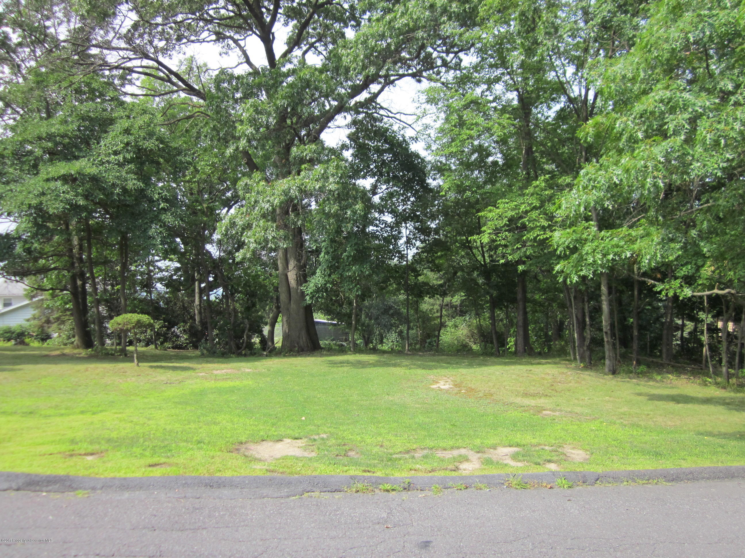 38 Carol Road Peckville, PA 18452 - Photo 7 of 11 a swimming pool with outdoor seating and yard