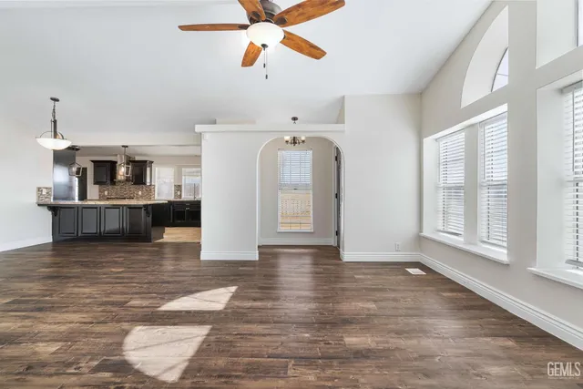 a view of a kitchen with a sink and microwave