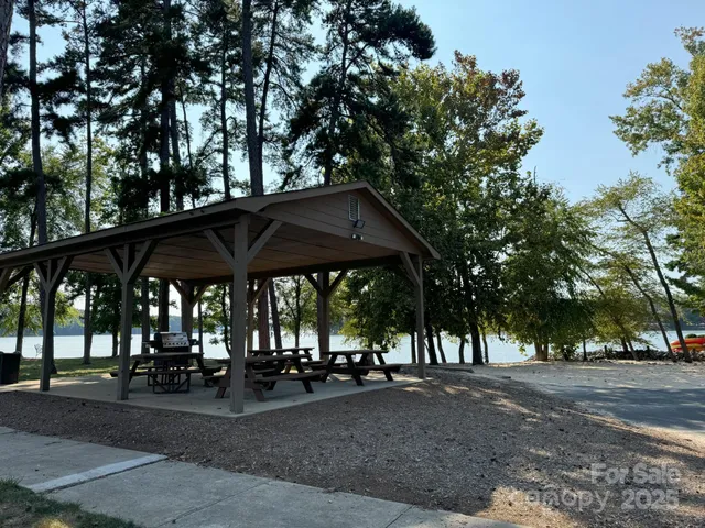 a view of an ocean with trees