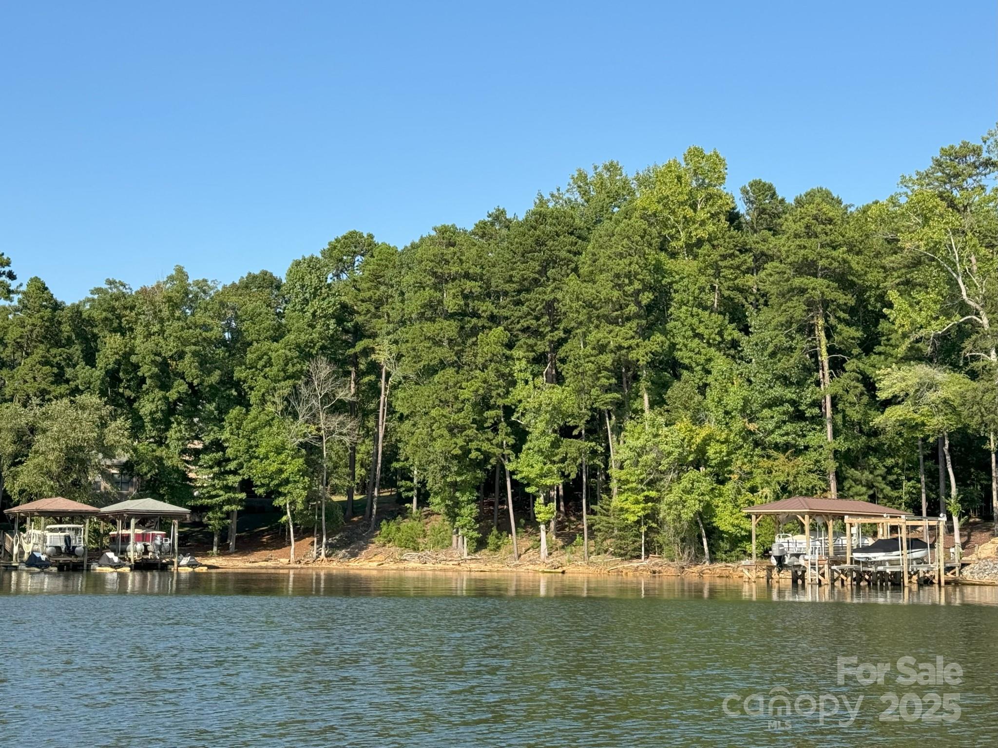 1532 Reflection Pointe Boulevard Belmont, NC 28012 - Photo 3 of 20 a view of a lake with houses