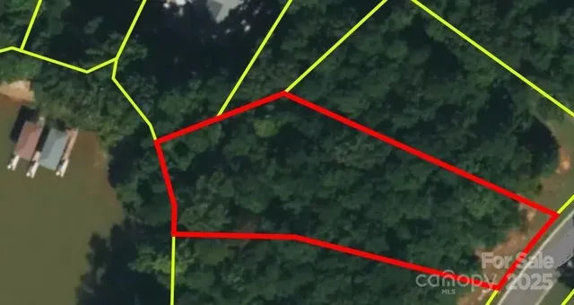 a view of a lake with a building in the background