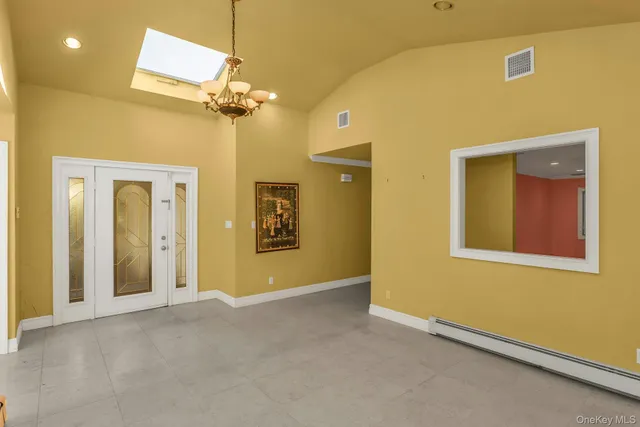 a view of a bathroom with a shower and a sink