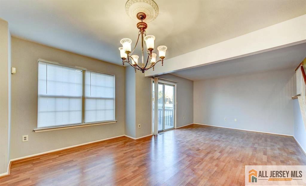 115 Salem Road North Brunswick, NJ 08902 - Photo 11 of 24 wooden floor in an empty room with a window
