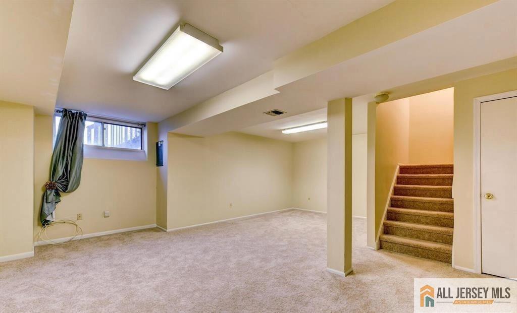 115 Salem Road North Brunswick, NJ 08902 - Photo 23 of 24 a view of a hallway with wooden floor and entryway