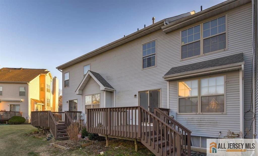 115 Salem Road North Brunswick, NJ 08902 - Photo 24 of 24 a view of a house with wooden deck