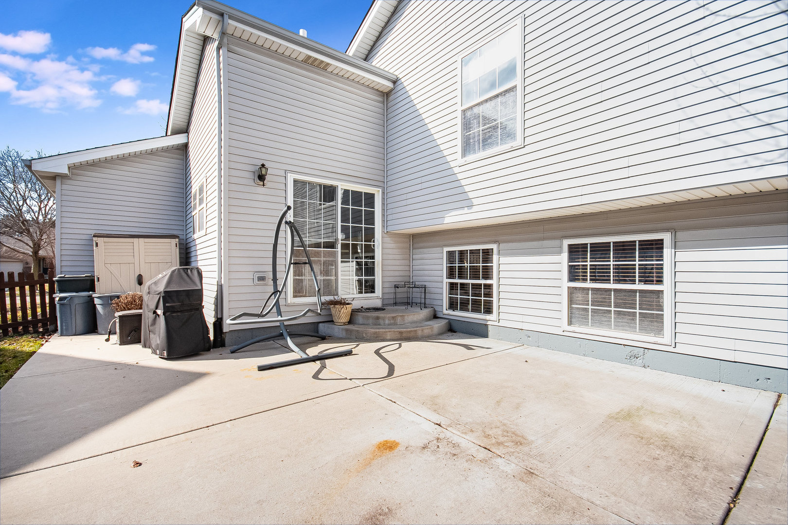 7211 Faxton Lane Plainfield, IL 60586 - Photo 16 of 21 a view of house with outdoor seating area