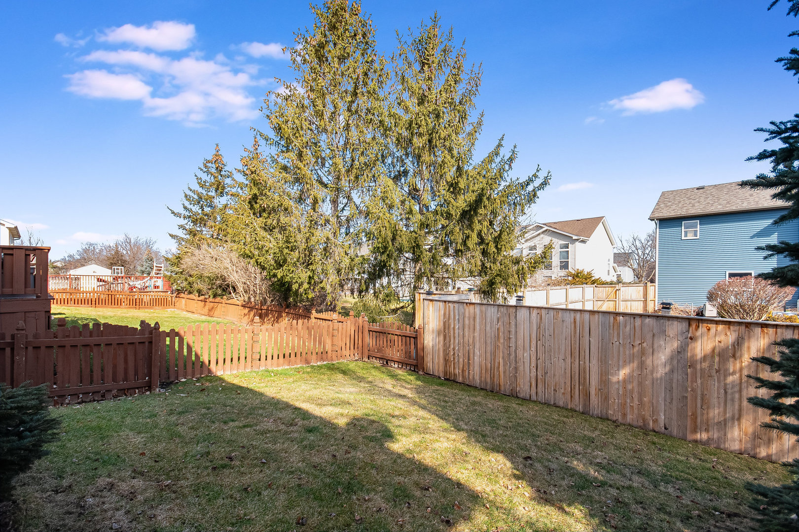 7211 Faxton Lane Plainfield, IL 60586 - Photo 19 of 21 a view of backyard with wooden fence