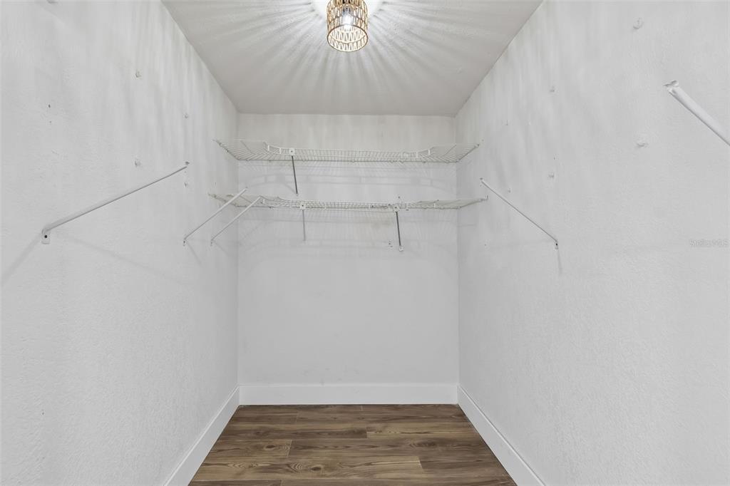 16108 5th Street East Redington Beach, FL 33708 - Photo 23 of 46 a view of a room with racks on the wall