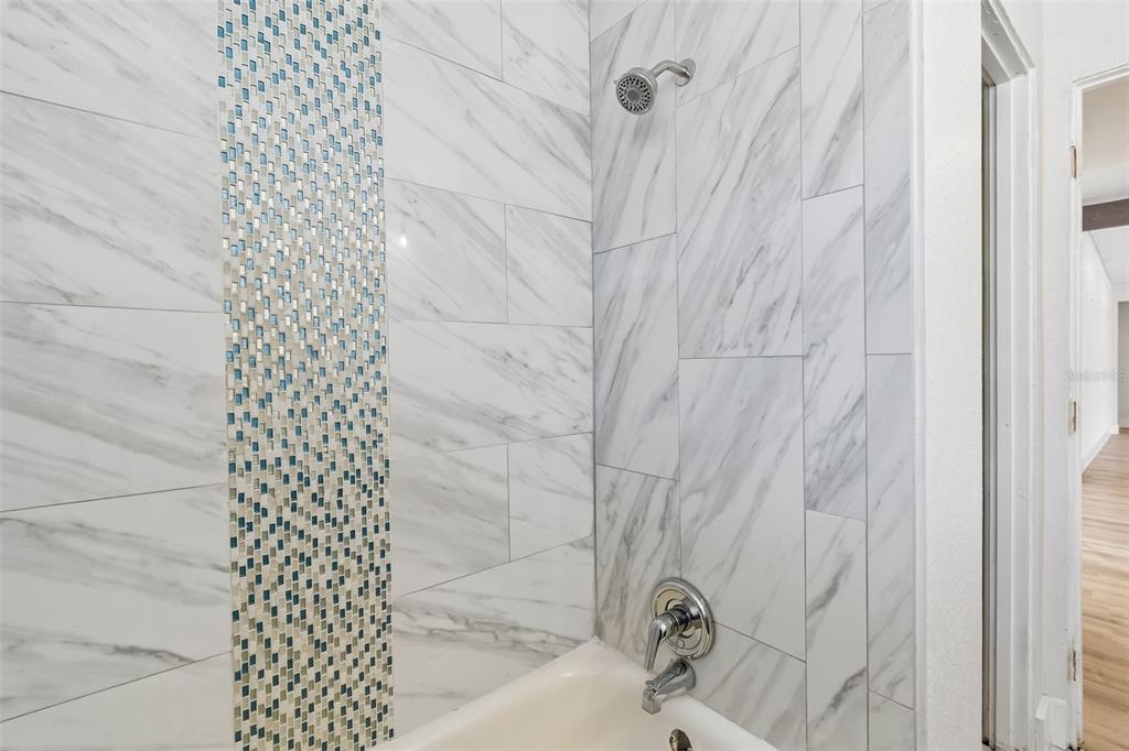 16108 5th Street East Redington Beach, FL 33708 - Photo 27 of 46 a bathroom with a bathtub