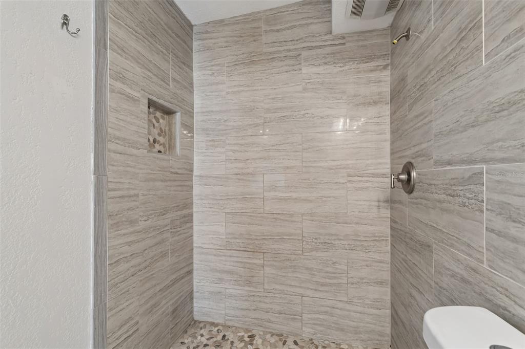 16108 5th Street East Redington Beach, FL 33708 - Photo 31 of 46 a bathroom with a toilet