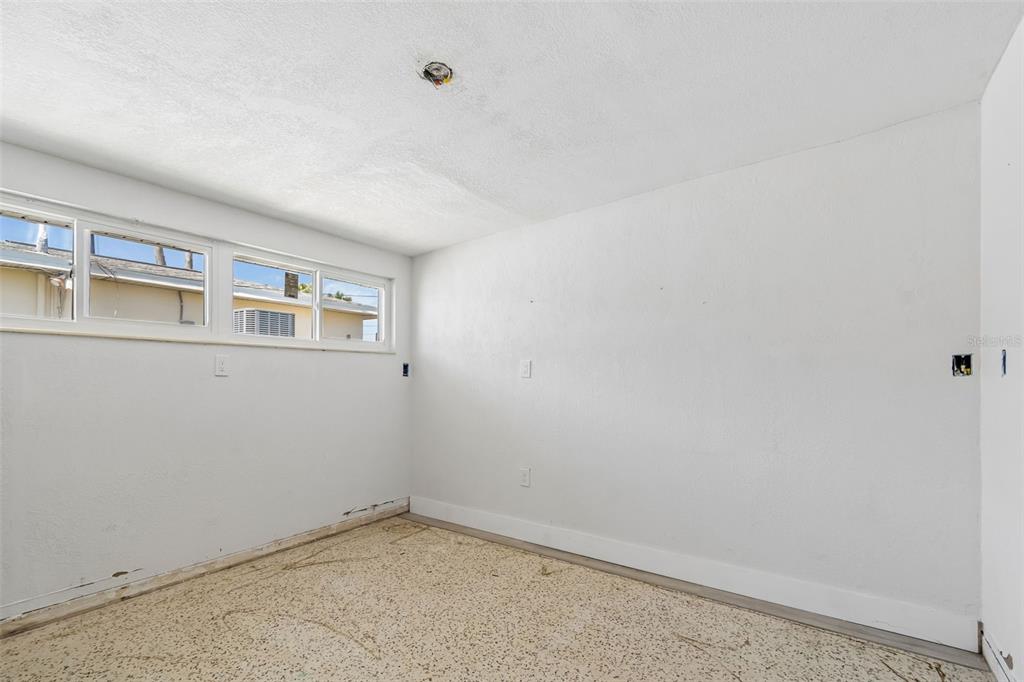 16108 5th Street East Redington Beach, FL 33708 - Photo 33 of 46 an empty room with windows