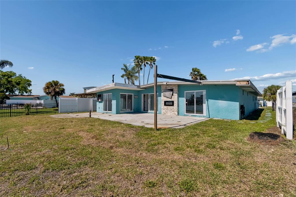 16108 5th Street East Redington Beach, FL 33708 - Photo 35 of 46 a front view of a house with garden