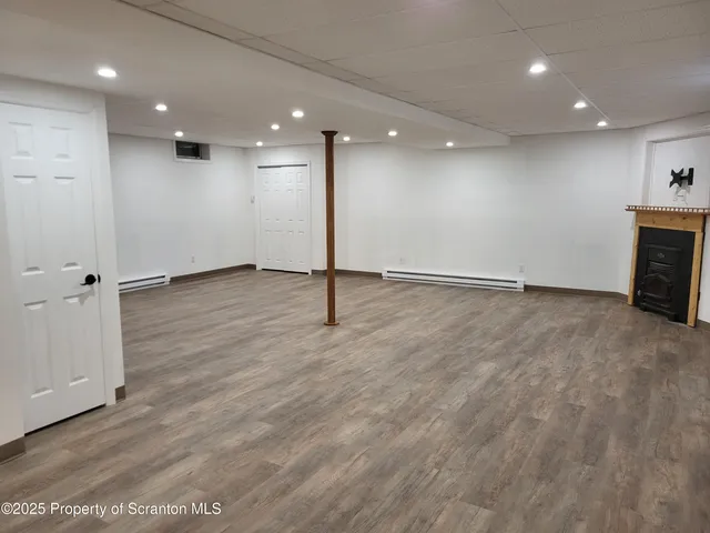 a bedroom with a bed and a table